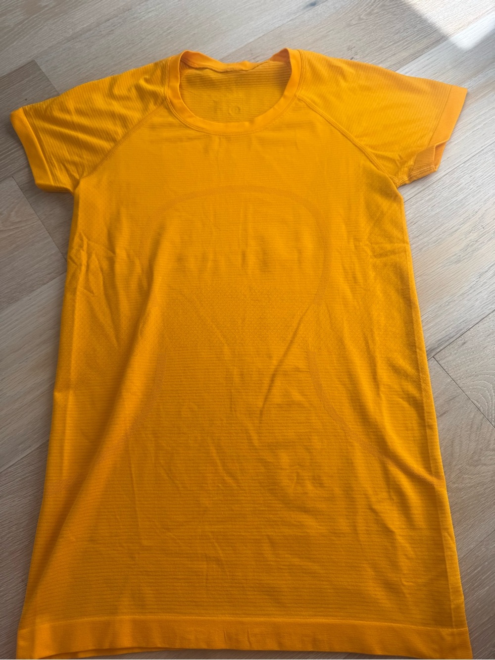 lululemon athletica Women's Short Sleeve Tee in Bright Orange *waist length